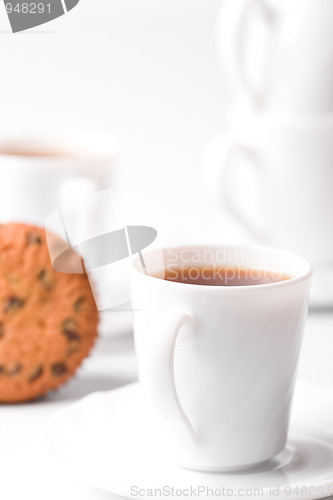 Image of cups of coffee and muffin