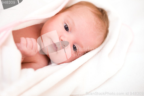 Image of baby after bath in towel. soft focus
