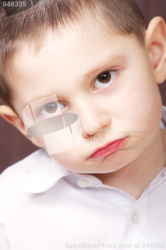 Image of Kid in white shirt