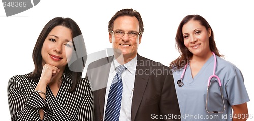 Image of Hispanic Woman with Husband and Female Doctor or Nurse