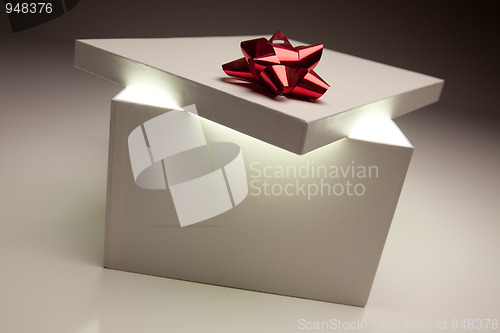 Image of Red Bow Gift Box Lid Showing Very Bright Contents