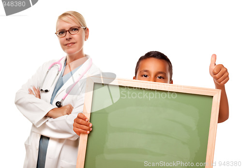 Image of Female Doctor with Hispanic Child Holding Chalk Board