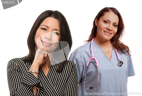 Image of Hispanic Woman with Female Doctor or Nurse