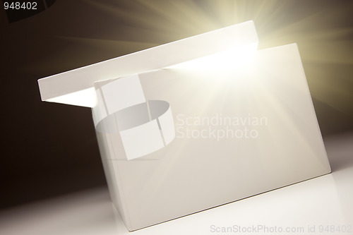 Image of White Box with Lid Revealing Something Very Bright