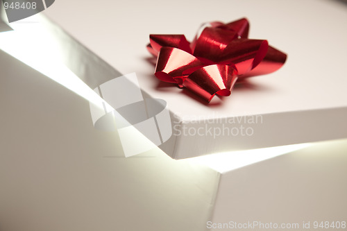 Image of Red Bow Gift Box Lid Showing Very Bright Contents