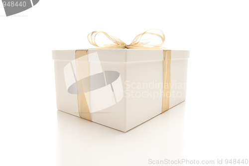 Image of White Gift Box with Gold Ribbon Isolated