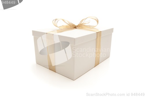 Image of White Gift Box with Gold Ribbon Isolated