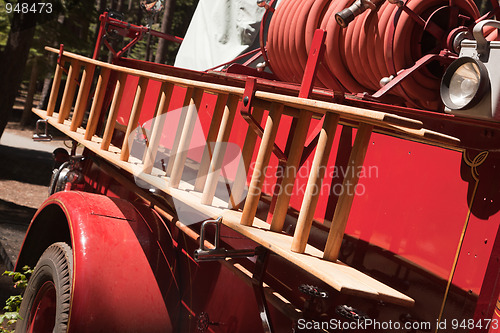 Image of Vintage Fire Truck with Latter and Hose