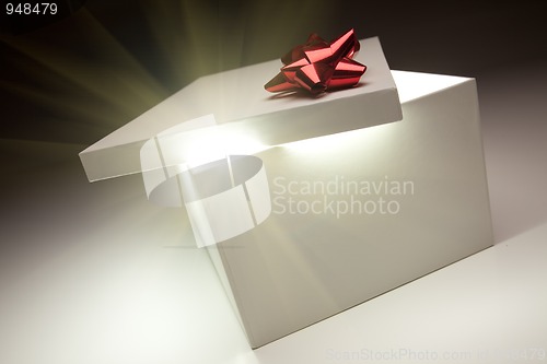 Image of Red Bow Gift Box Lid Showing Very Bright Contents