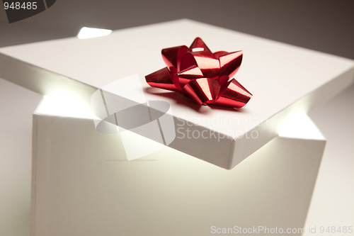 Image of Red Bow Gift Box Lid Showing Very Bright Contents