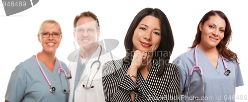 Image of Hispanic Woman with Male and Female Doctor or Nurse