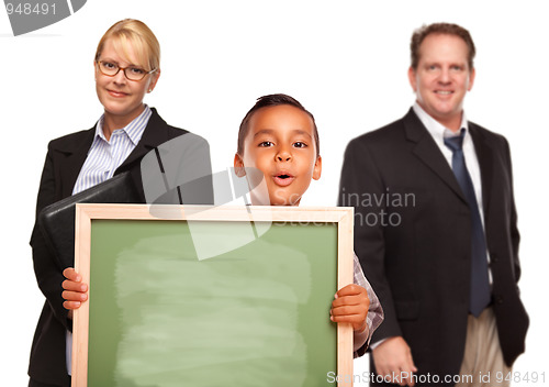 Image of Hispanic Boy Holding Chalk Board with Teachers Behind