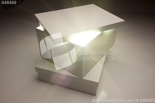 Image of White Box with Lid Revealing Something Very Bright