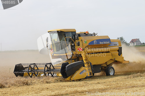 Image of harvester in the corn