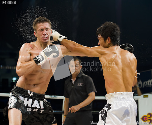 Image of russian vs korean thai boxer in bangkok