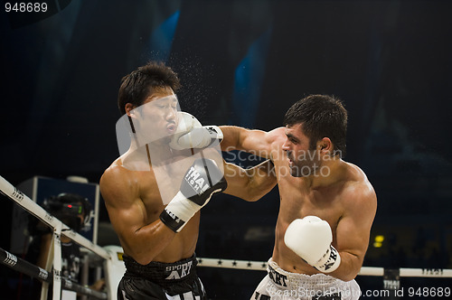Image of japanes vs turkish thai boxer in bangkok