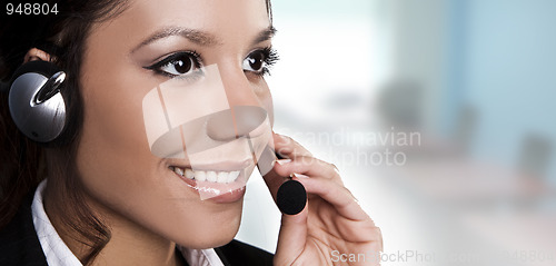 Image of isolated portrait of a beautiful helpdesk or support line operat