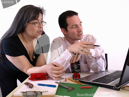 Image of Coworkers at Desk