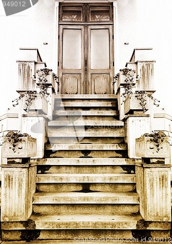 Image of Old entry in a house. Sepia