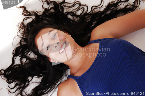 Image of Girl lying on floor.
