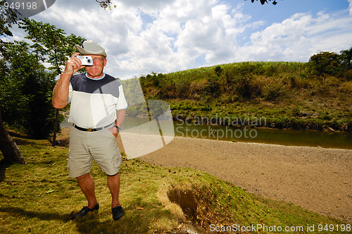 Image of Tourist with camera