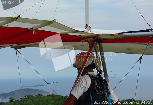 Image of Hang glider preparing to jump