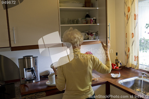 Image of Senior in her kitchen