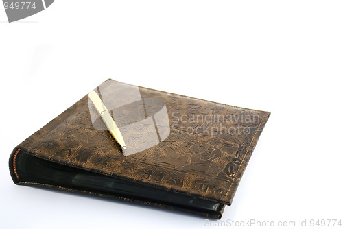 Image of The golden pen with an album