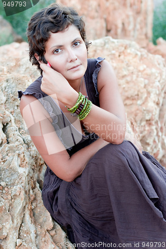 Image of woman in brown dress