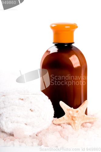 Image of salt, towel, body lotion and seastar