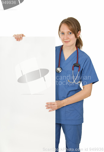 Image of Friendly nurse holding blank banner