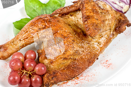 Image of Half roasted chicken closeup