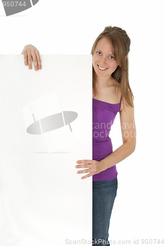 Image of Casual young women holding a blank banner ad