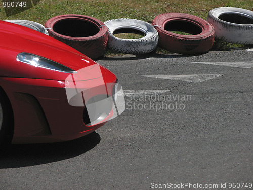 Image of Red car on the racetrack