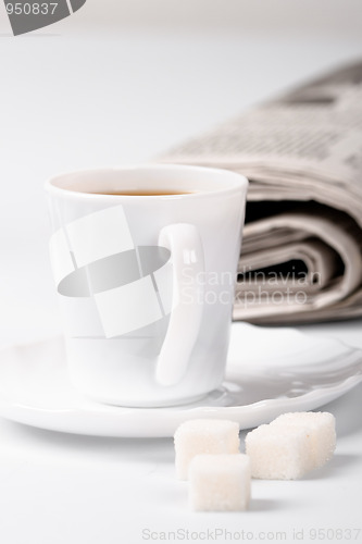 Image of coffee, sugar and newspapers