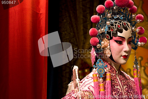 Image of chinese opera dummy and red cloth as text space ,it is a toy,not