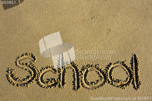 Image of Message says "school" in the Sand on a Beach