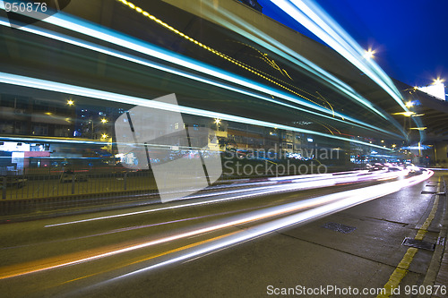 Image of Modern Urban City with Freeway Traffic at Night