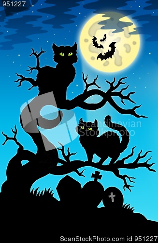 Image of Two cats silhouette with full moon