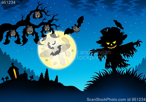 Image of Halloween landscape with scarecrow