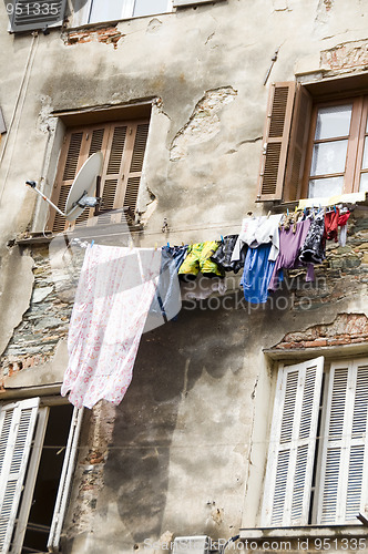 Image of laundry hanging medieval architecture bastia corsica