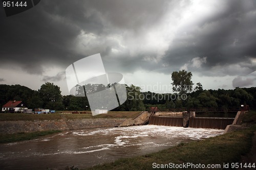 Image of Storm over water dam