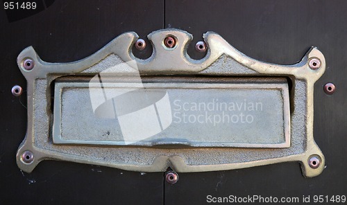 Image of Nameplate on wooden door