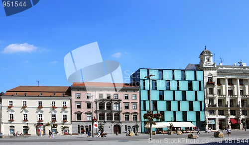 Image of Freedom square in day light with modern and historical buildings