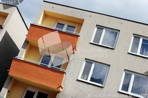 Image of Detail of orange and yellow prefab house