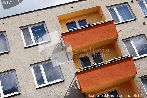 Image of Detail of orange and yellow prefab house