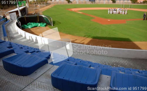 Image of Blue seats in an empty stadium