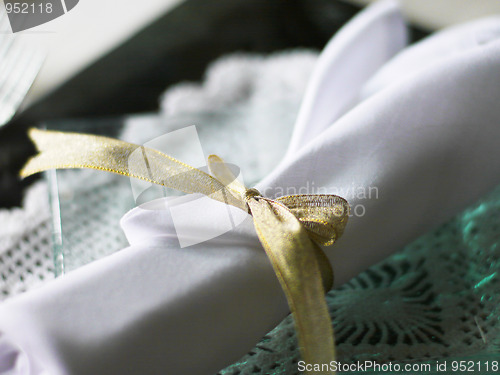 Image of White napkin on a glass plate