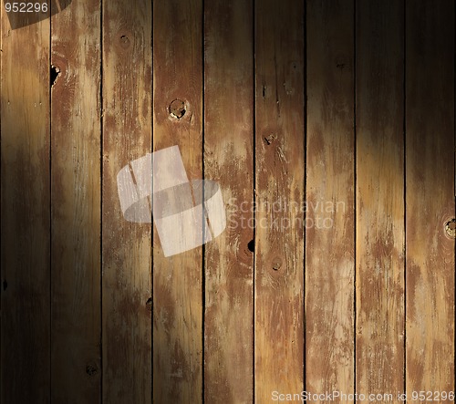 Image of Distressed wooden surface diagonally lit