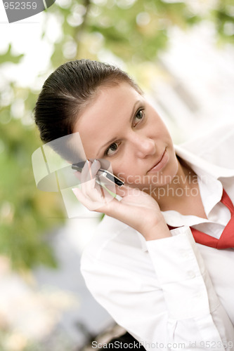 Image of businesswoman talking by phone